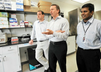 (Left to right) Nick Hammond, chief technology officer; Ken Malone, CEO; and Srinivas Rapireddy, research scientist, talk in Ablitech Inc.'s new lab. (Kim Hairston, Baltimore Sun / February 15, 2012)