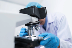 Scientist Using Microscope Free Stock Photo