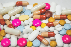 Pile of White Pink and Brown Oblong and Round Medication Tablet Free Stock Photo