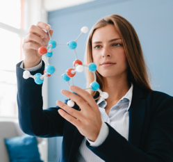 Cursor and female scientist studying molecule model 2022 12 16 22 26 57 utc jpg